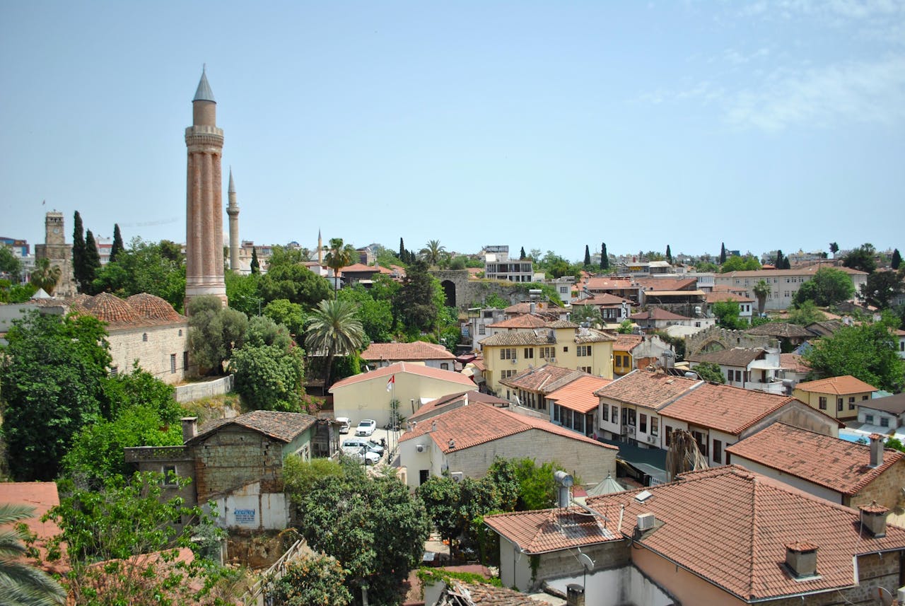 Aerial view of Kaleici, Antalya's historic old town with the Yivli Minaret — the vibrant city UK dental tourists explore between treatment appointments